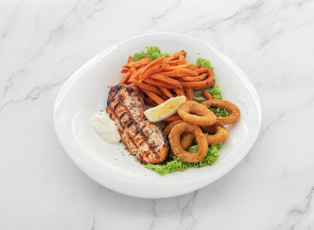Char-grilled fish with dill and sweet potato fries