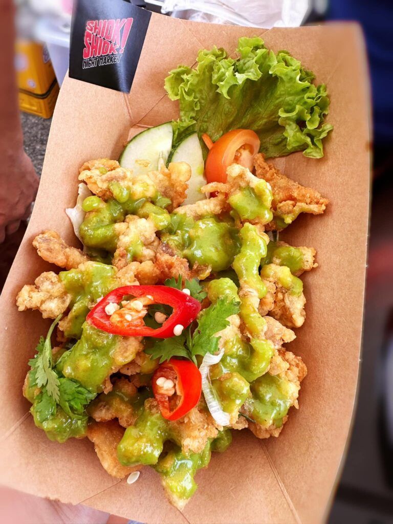 Crispy chicken skin with green curry sauce